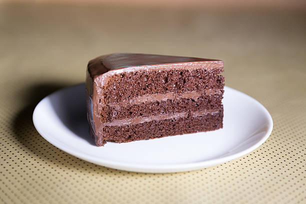 istock Delicious dark chocolate cake in white plate 637686312