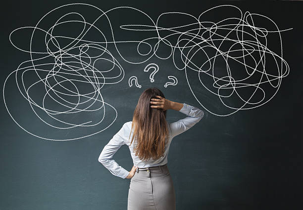 istock Businesswoman Mess on Blackboard 637689814