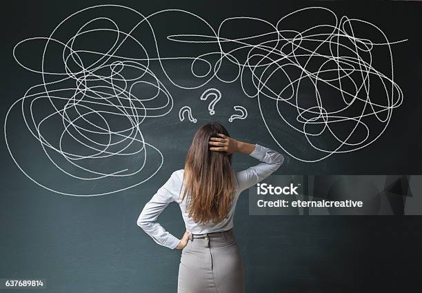 Businesswoman Mess On Blackboard Stock Photo - Download Image Now - Confusion, Chaos, Rear View