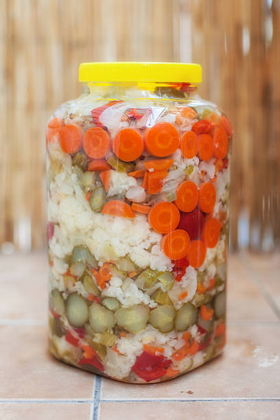 mixed vegetable winter pickles salad - sauerkraut cabbage paprika salad imagens e fotografias de stock