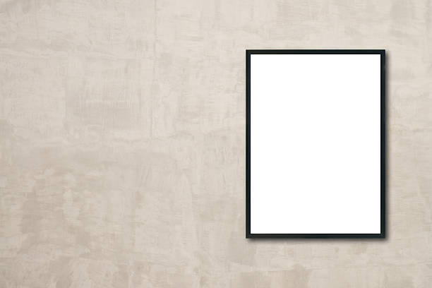 istock Mock up blank frame hanging on wall in room 637694960