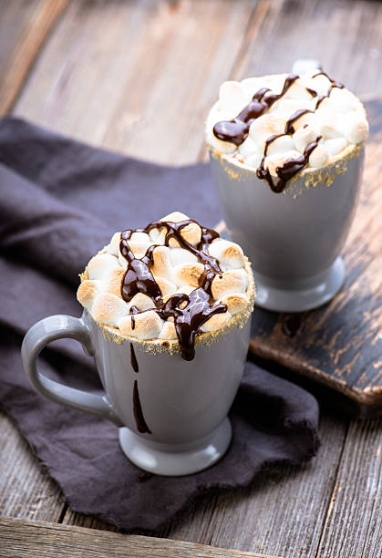istock S'mores drink. Two mugs of hot chocolate with marshmallows 637696184