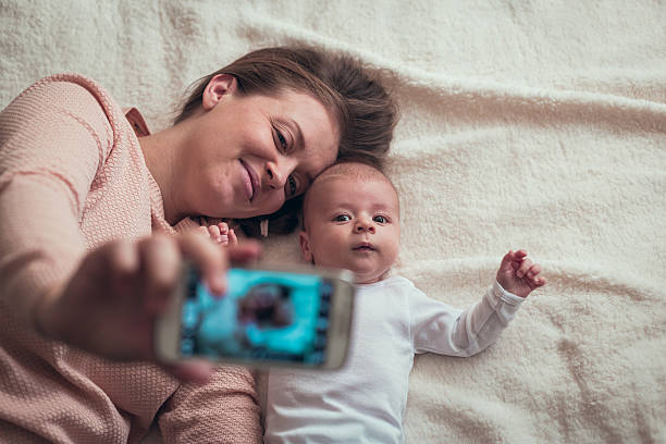 istock Taking selfie with my cute baby boy 637696232