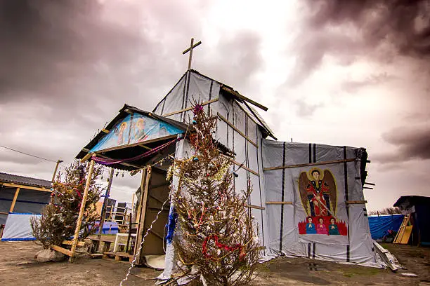 A picture of a Christian Church built by refugees at the Jungle, Calais, France.  The picture was taken in January 2016