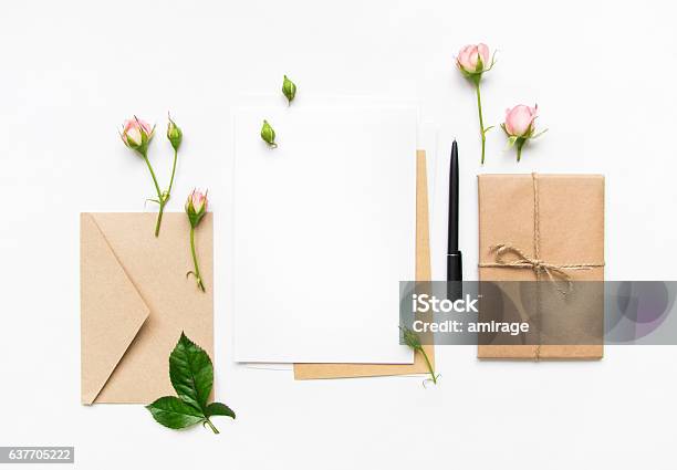 Letter Envelope And Gift With Pink Roses Holiday Flat Lay Stock Photo - Download Image Now