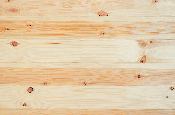 istock Fresh pine wood planks background top view 637706712