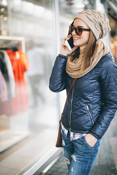 istock Young Woman Using Smart Phone In The Cit 637706722