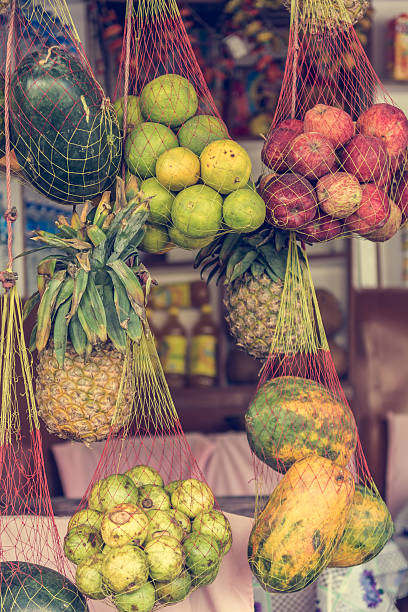istock Fresh fruit hanging at street shop. 637708020