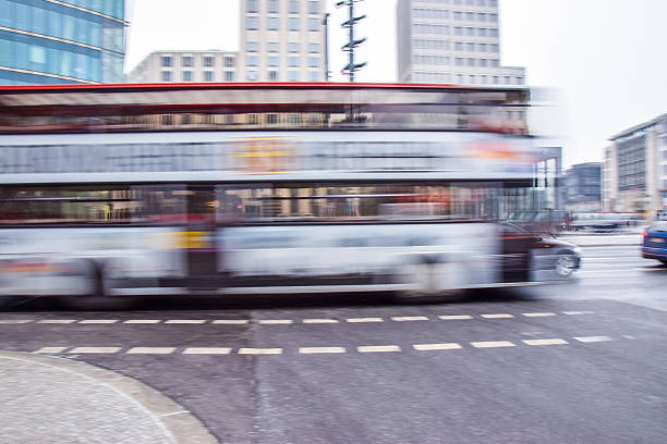 istock Fast moving bus in city traffic 637711436