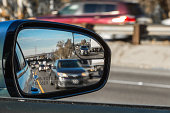 Objects in mirror are closer than they appear on car