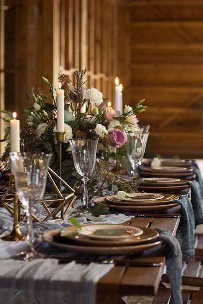 istock Laid Table By wedding banquet in a barn. Vertical frame 637717608