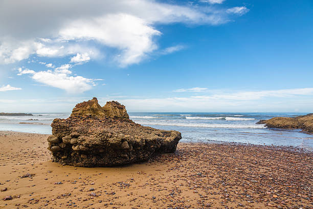 istock Legzira beautiful beach in Morocco 637719360