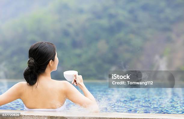 Young Woman Relaxing In Hot Springs Stock Photo - Download Image Now - Heat - Temperature, Swimming Pool, Hot Spring