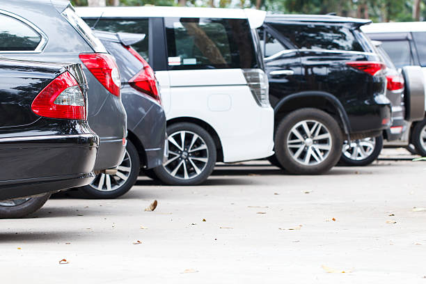 istock Black car parking lot 637720990
