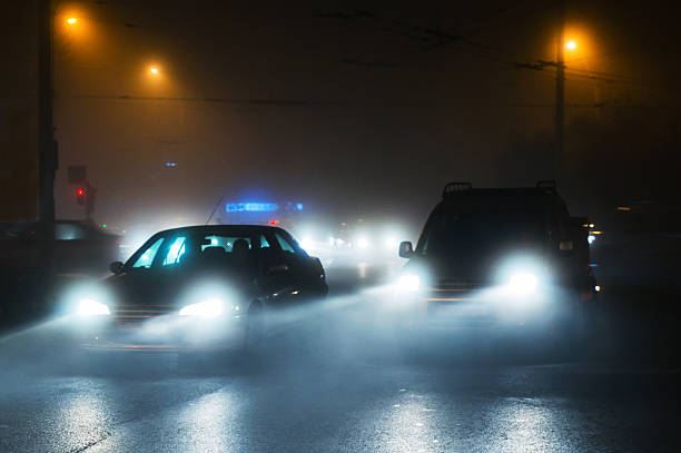 istock Cars driving in fog 637721196