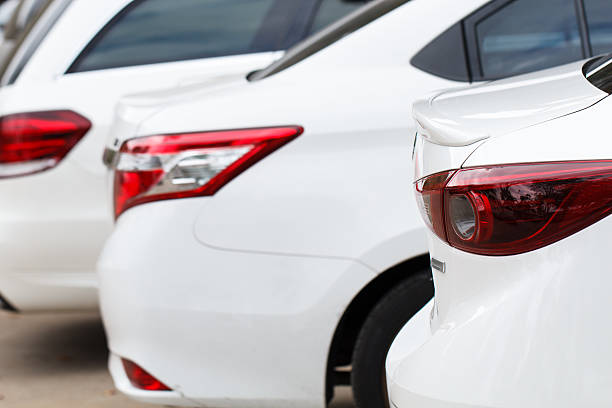 istock White car parking lot in line 637723568