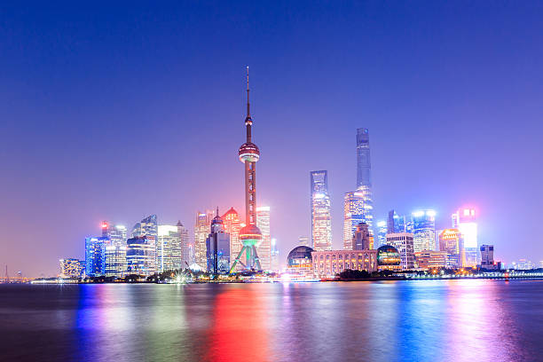 istock Beautiful Shanghai skyline at night,modern urban background 637730028