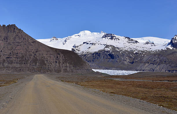istock Driving gravel road in Iceland 637730038