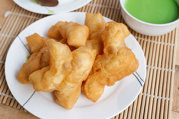 istock Chinese bread stick and pandan coconut custard dip 637730238