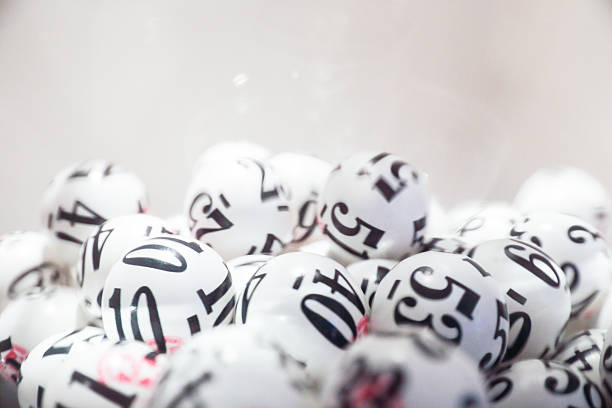 Group of black and white lottery balls stock photo