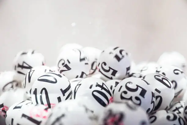 Photo of Group of black and white lottery balls