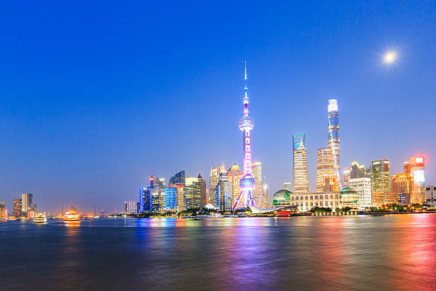 istock Beautiful Shanghai skyline at night,modern urban background 637732390
