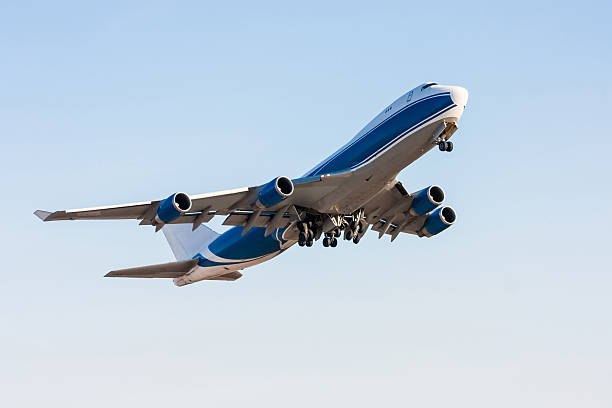 istock Wide body cargo airplane in the air 637732454
