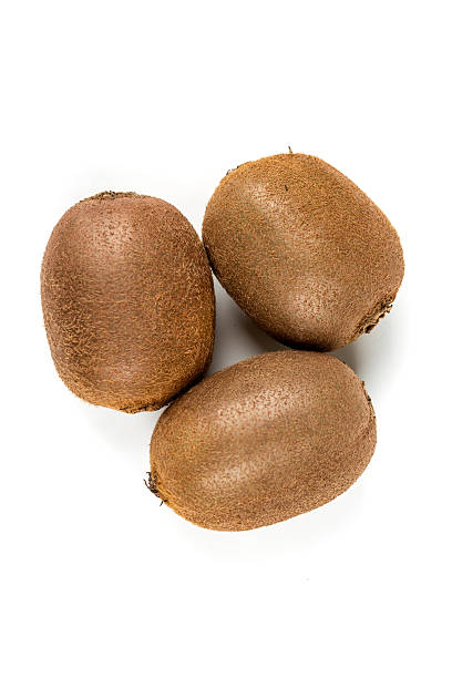 istock Whole ripe kiwis isolated on a white background 637733228