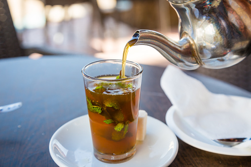 Traditional mint tea, also known as Berber whiskey. Teahouse in Sidi Ifni, Morocco.