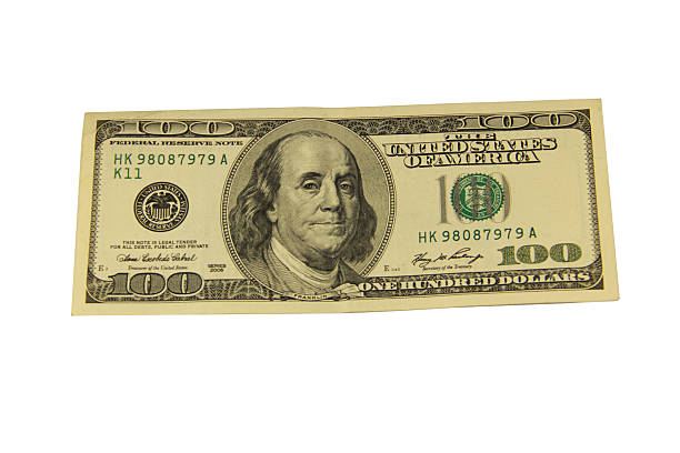 istock One hundred dollar bill isolated on the white background 637739384