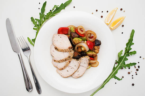 istock Baked chicken fillet with vegetable ragout 637740542