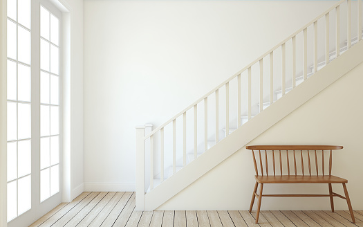 Interior of hallway with wood stairway. Wall mockup. 3d render.