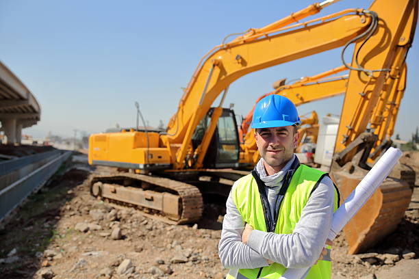 Construction Engineer and Machinery stock photo