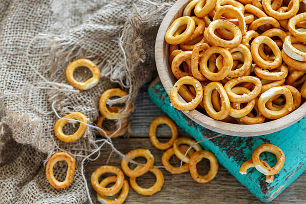 istock Bowl with salt bagels closeup. 637746294