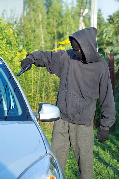 istock Villain with a gun threatened driver 637747798