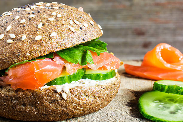 Sandwich with cereals bread and salmon for healthy breakfast
