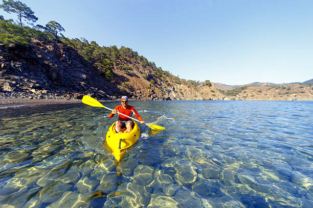 istock Man traveling by canoe . 637749522