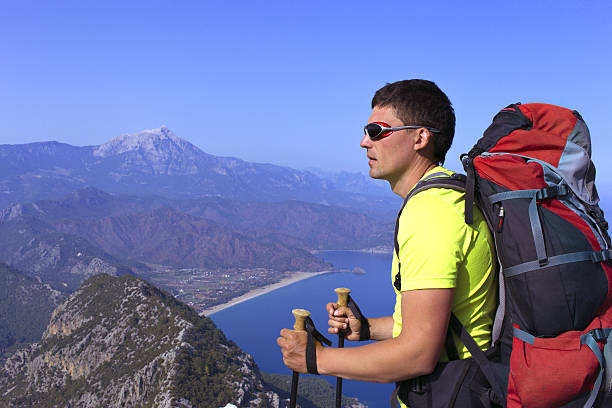 istock Summer hiking in the mountains with a backpack . 637749960