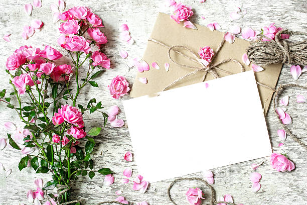 istock blank white greeting card with pink rose flowers bouquet 637753152