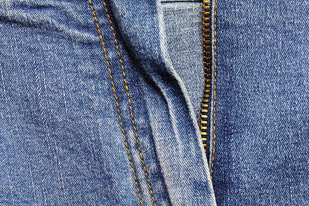 istock jeans background texture , denim fabric with zip 637753202