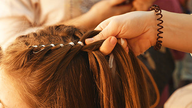 istock Female model getting her hair dressed 637753740