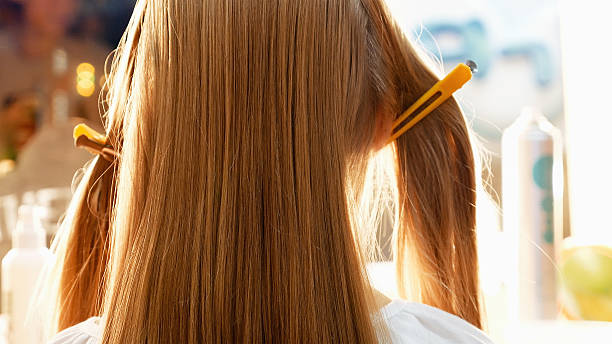 istock Female model getting her hair dressed 637753806