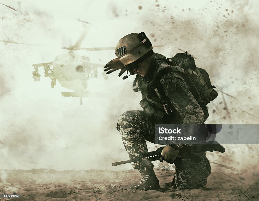 US soldier and combat helicopter approaching US soldier in the desert during the military operation turning to combat helicopter approaching covering his eyes. Backup is coming Armed Forces Stock Photo
