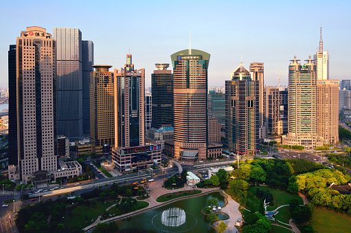 Aerial view of Shanghai Pudong Lujiazui financial district, The crowded office buildings at the sunset, China.