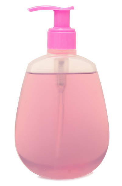 bottiglia cosmetica1 - vertical studio shot indoors pink foto e immagini stock