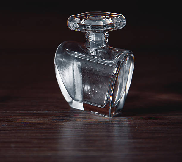 istock Bottle of woman perfume 637761282