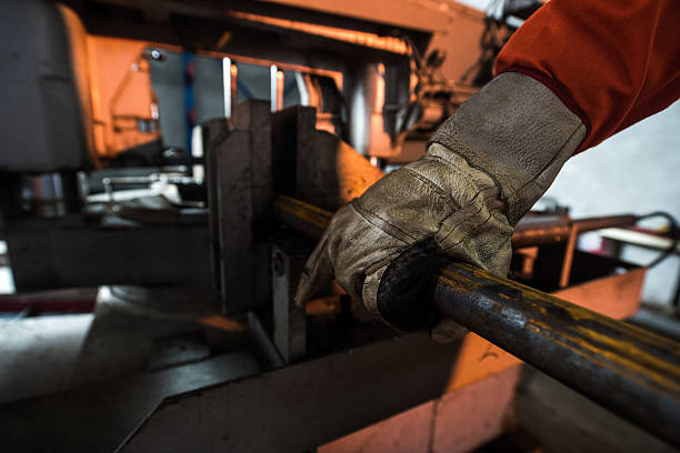 istock Close up of metal worker working with vice grip. 637763488