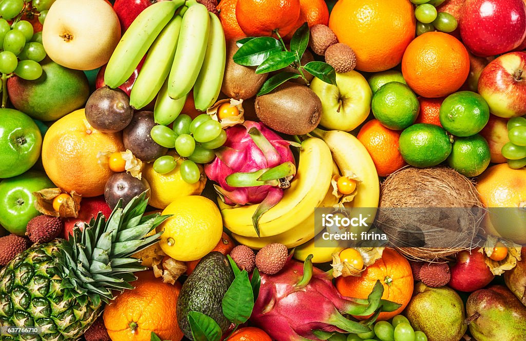 Fruit background Fresh fruit background as healthy eating and dieting concept, winter assortment, top view Fruit Stock Photo