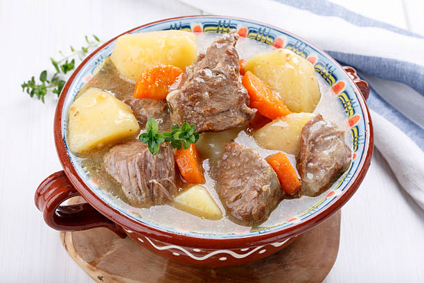 istock Meat stew with potatoes and carrots. Goulash soup. 637769424