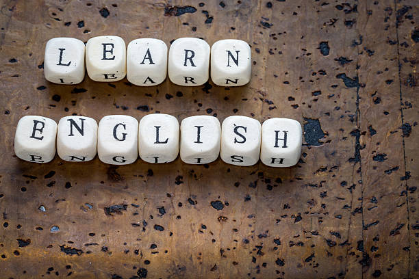 istock Learn english text on a wooden cubes 637776426